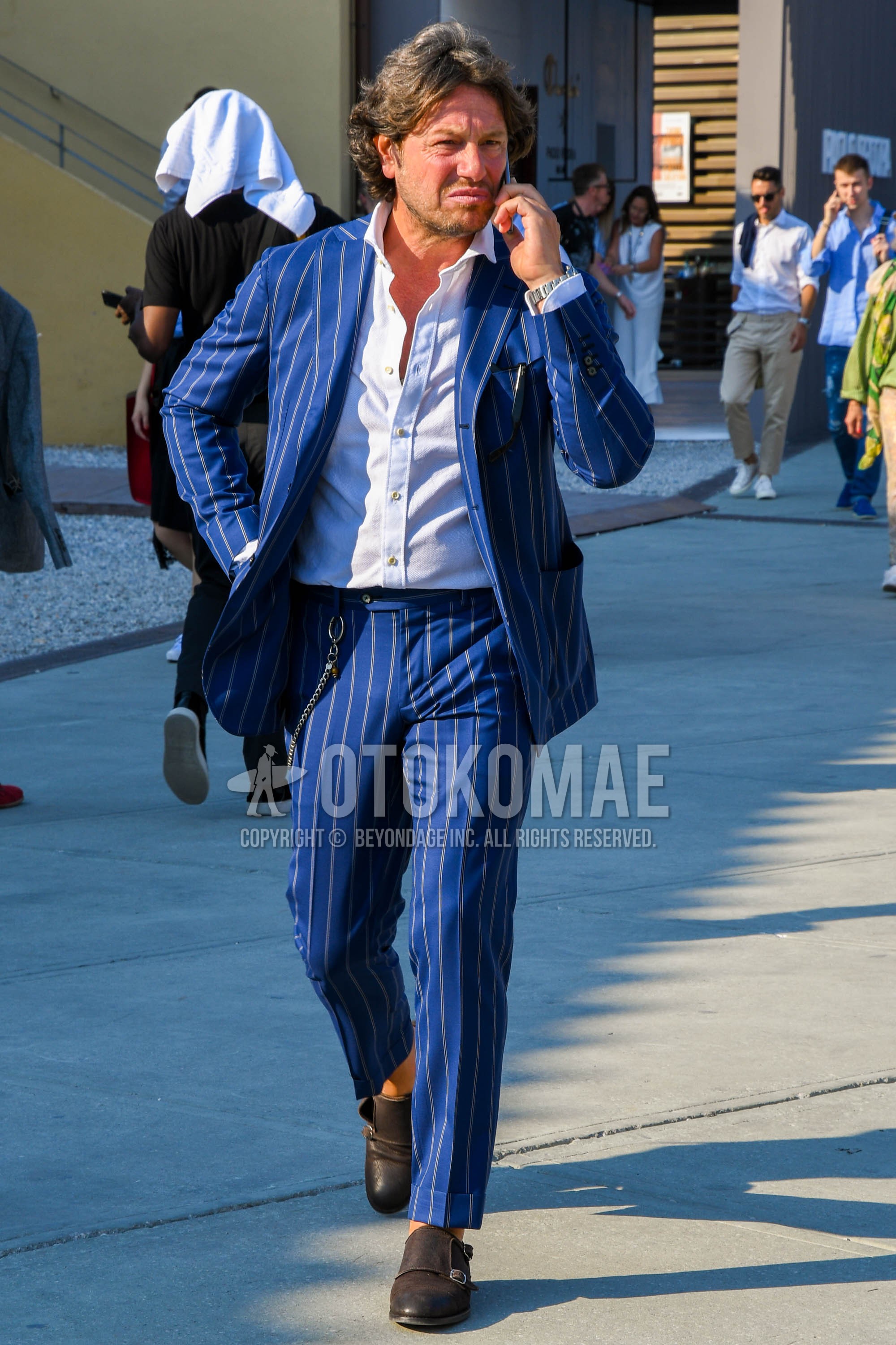 Men's spring summer autumn outfit with white plain shirt, brown monk shoes leather shoes, navy stripes suit.