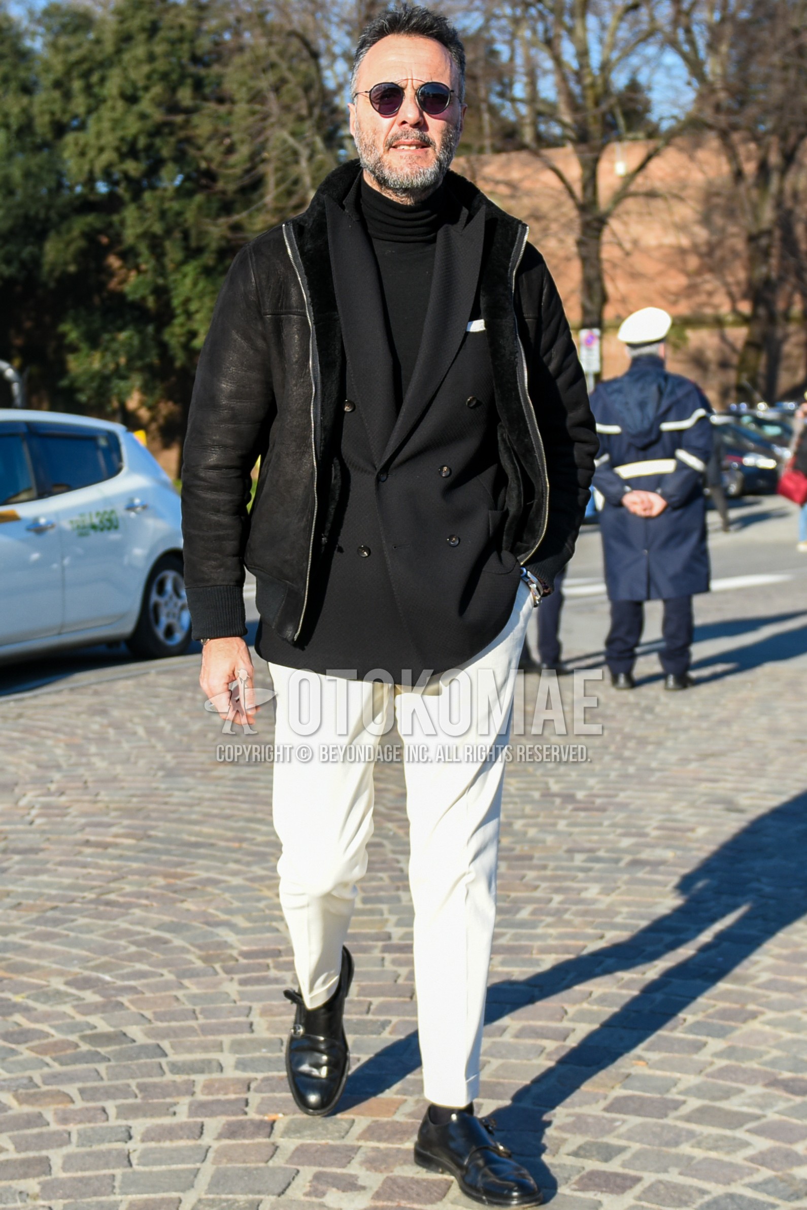 Men's autumn winter outfit with black plain sunglasses, black plain leather jacket, black plain tailored jacket, black plain turtleneck knit, white plain winter pants (corduroy,velour), black monk shoes leather shoes.