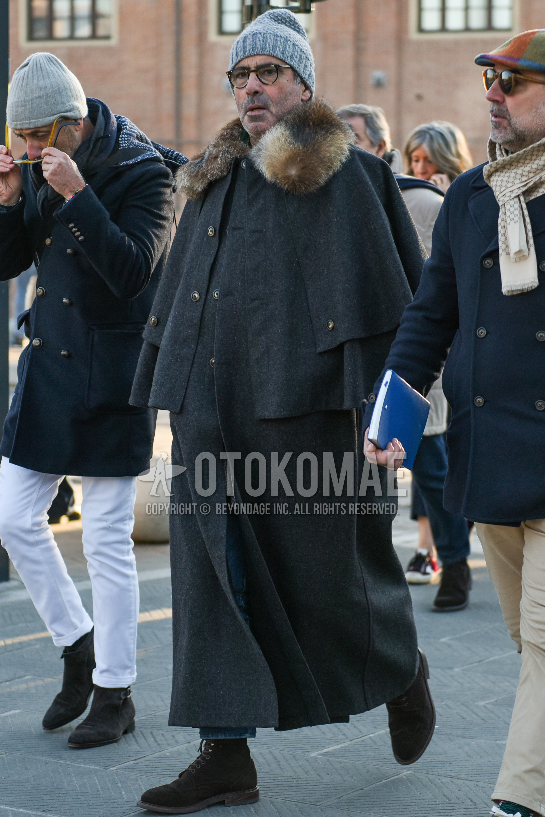 Men's autumn winter outfit with gray plain knit cap, brown tortoiseshell glasses, gray plain outerwear, gray plain denim/jeans, brown  boots.