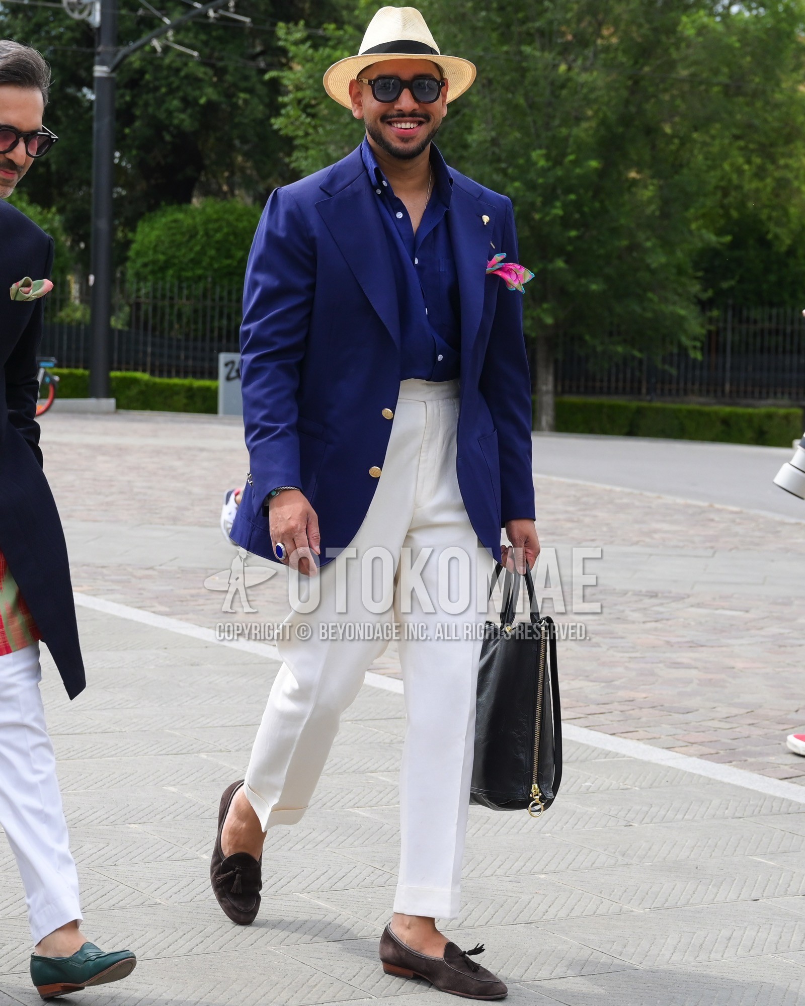Men's spring summer autumn outfit with white plain hat, blue plain sunglasses, navy plain tailored jacket, navy plain shirt, white plain slacks, brown tassel loafers leather shoes, brown suede shoes leather shoes, black plain briefcase/handbag.