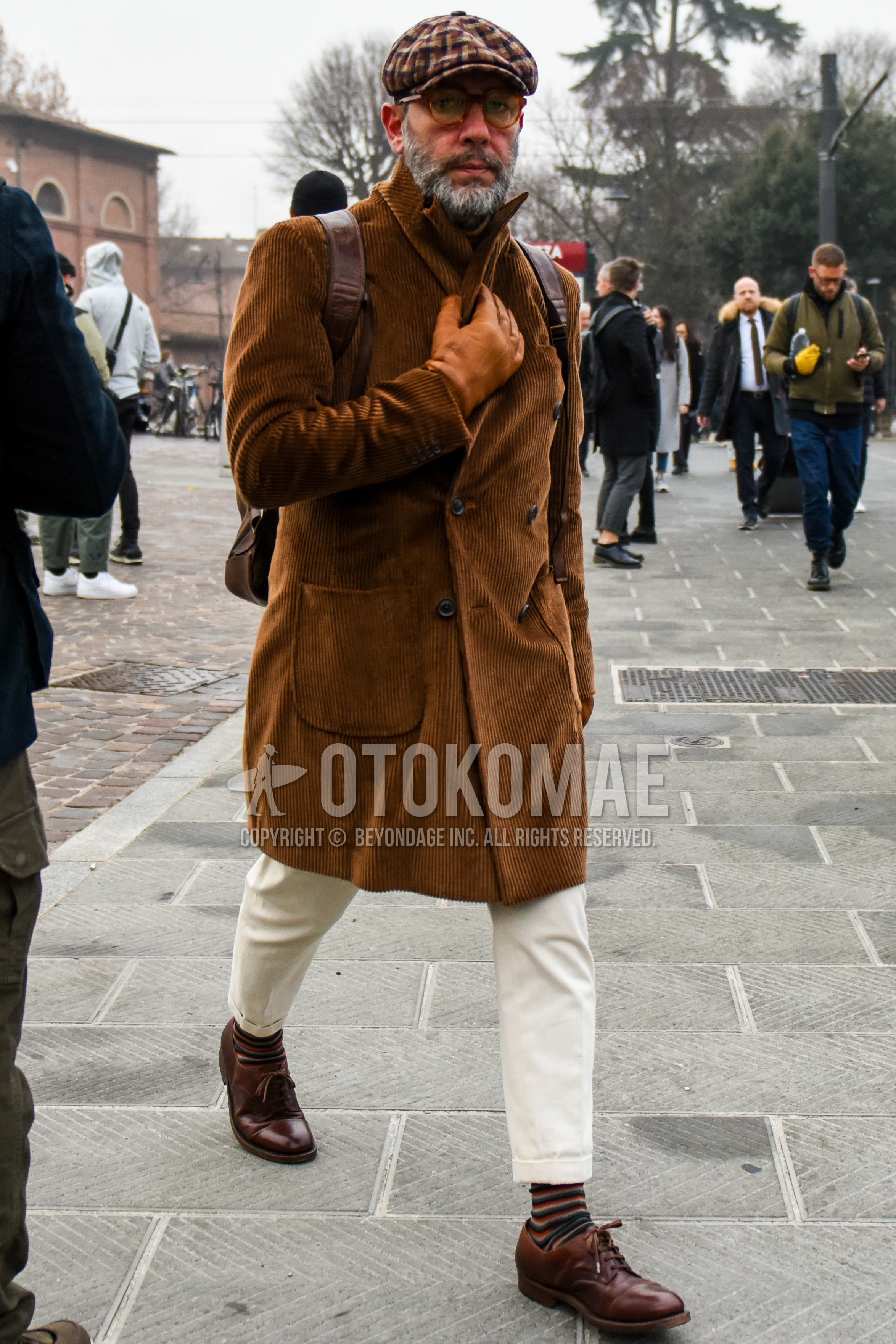 Men's winter outfit with brown check cap, plain glasses, brown plain chester coat, white plain cotton pants, brown plain toe leather shoes.