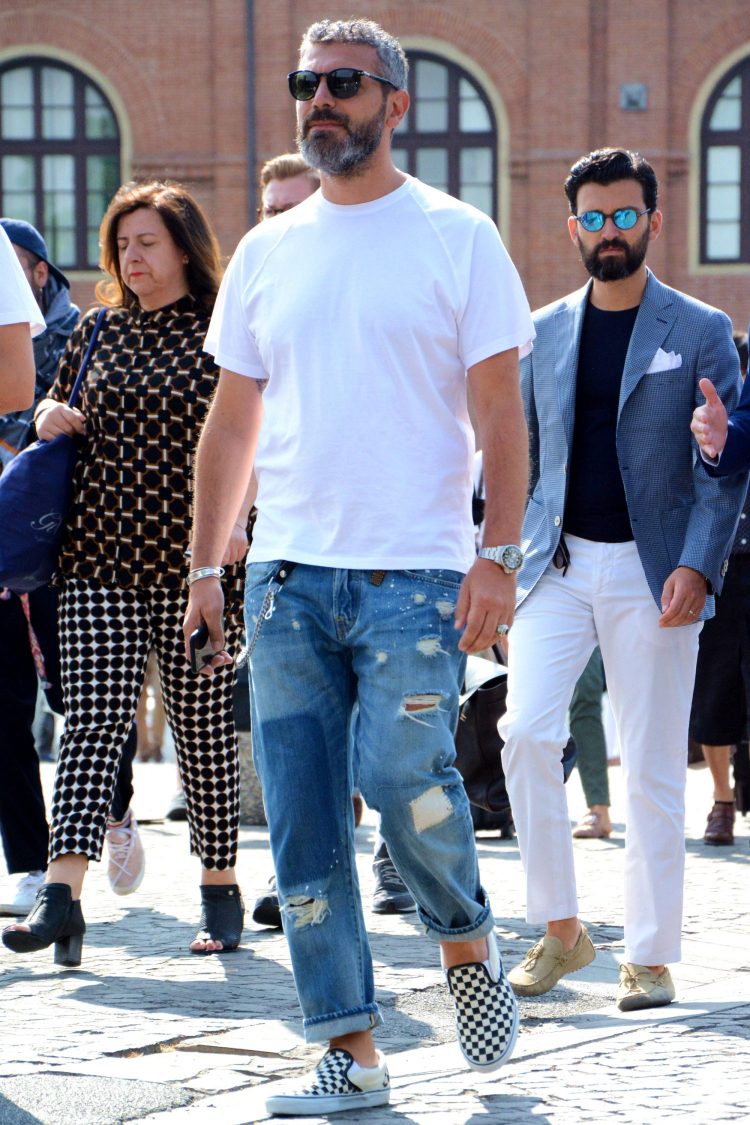 Damaged jeans add a stylish touch to an active look