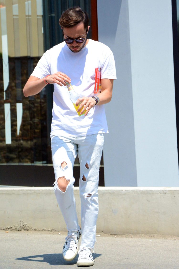 All-white coordinate with white damaged jeans for a more relaxed look