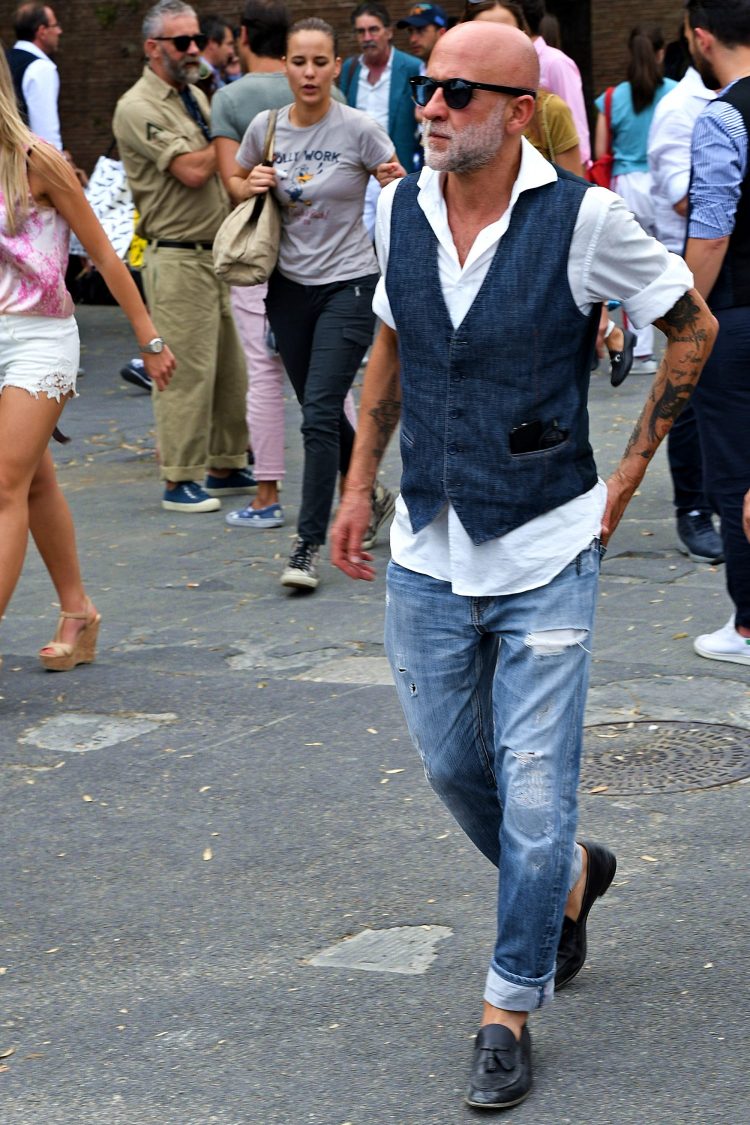 Denim on denim with denim gilet and damaged jeans
