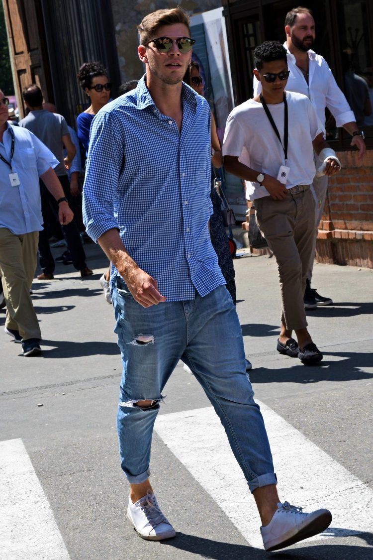 Damaged jeans and a clean gingham check shirt for a crisp look