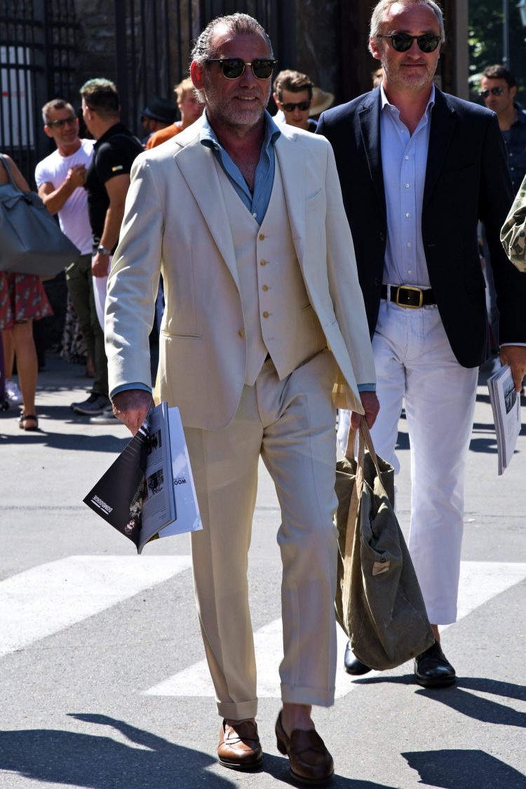 Summer suit style with blow-type sunglasses for a classic look