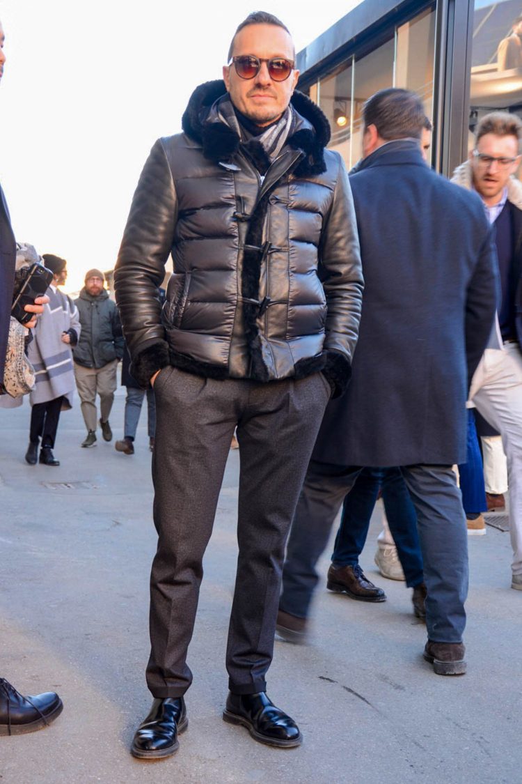 Luxurious down jacket and pleated slacks for an elegant look