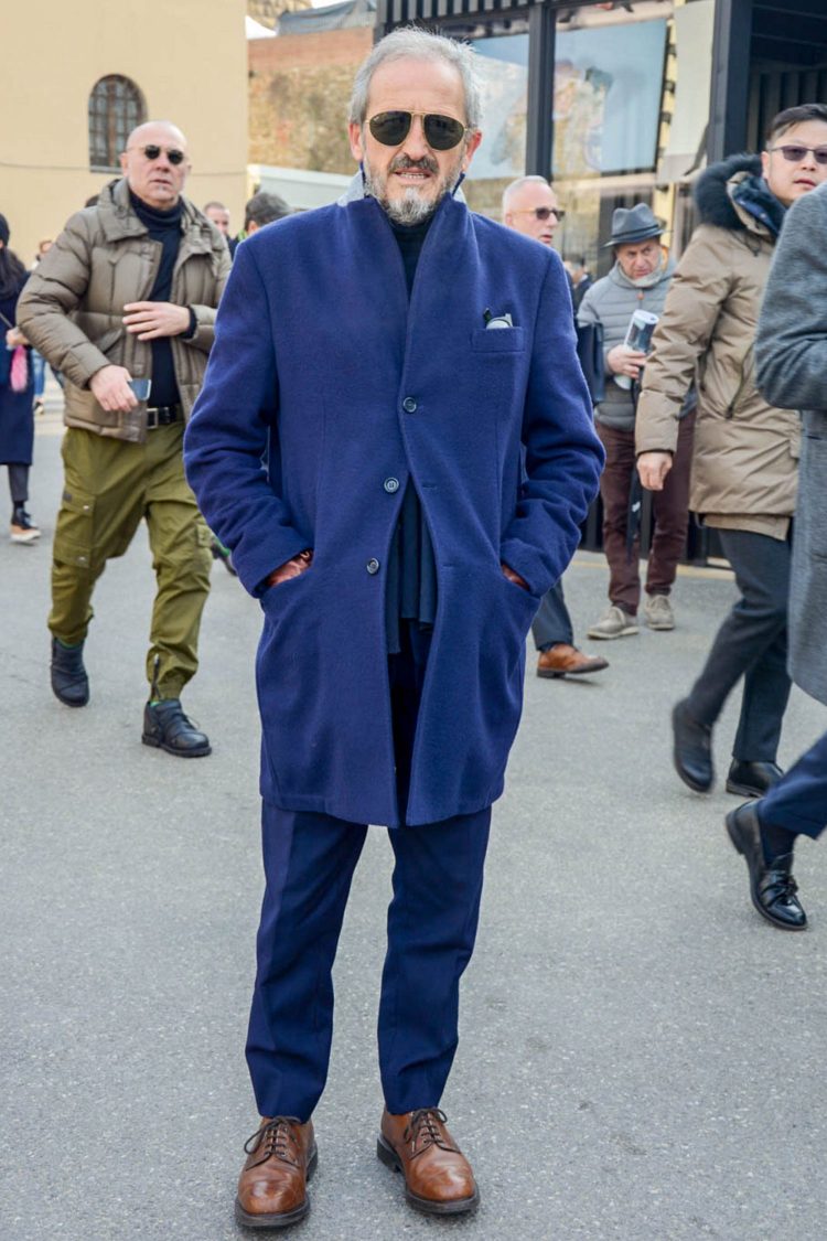 Chester coat collar up to accentuate the navy tone-on-tone coordinate