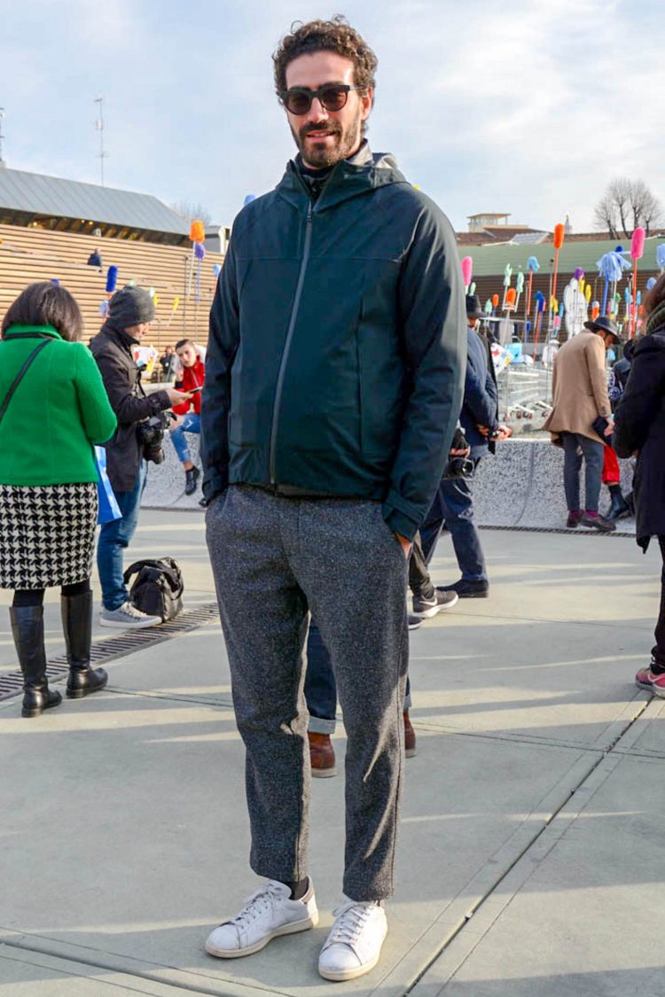 Coordinates with wool gray pants and nylon mountain parka for a crisp look
