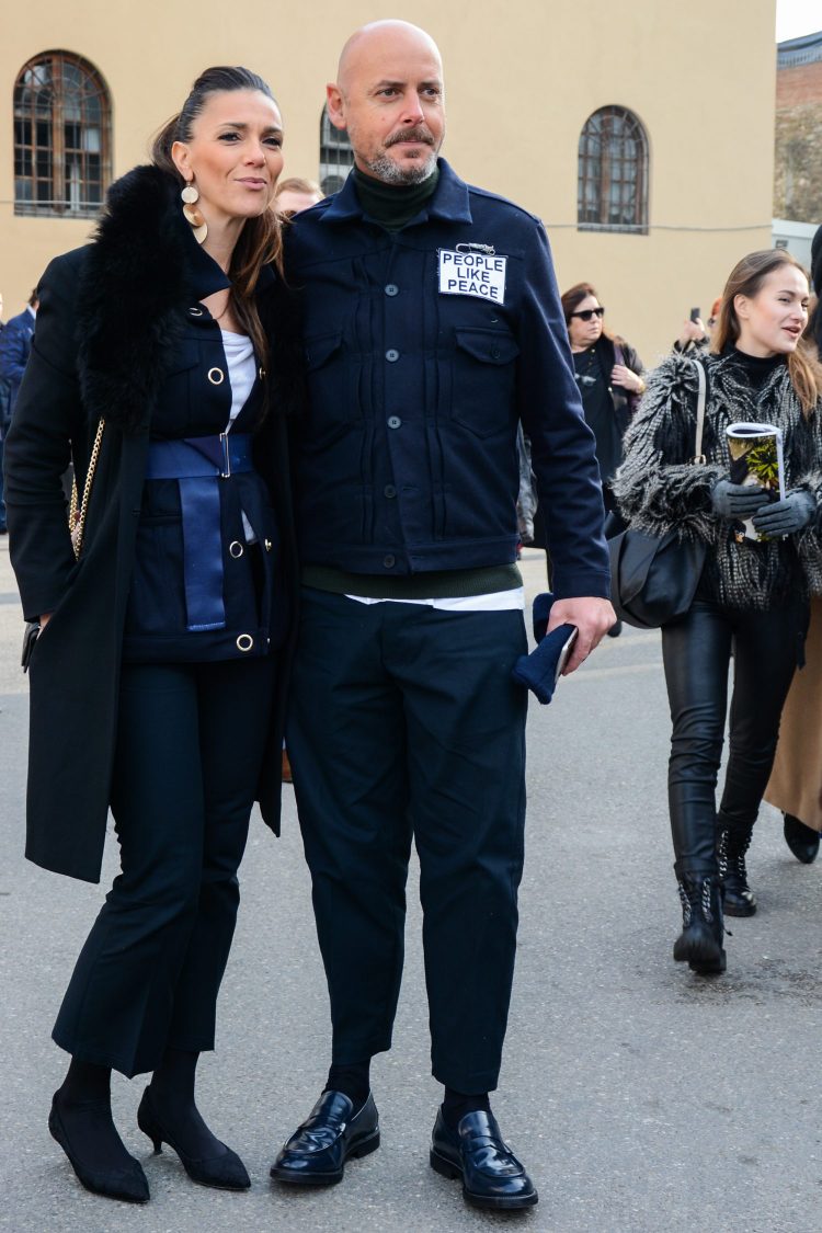 Men's coordinate expressing a cozy layered look with a short trucker jacket and turtleneck knit