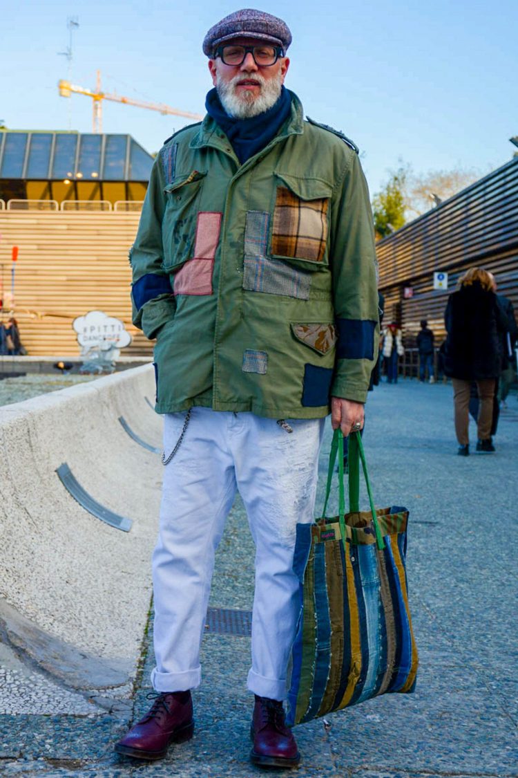 Military-inspired items with white pants for a clean look