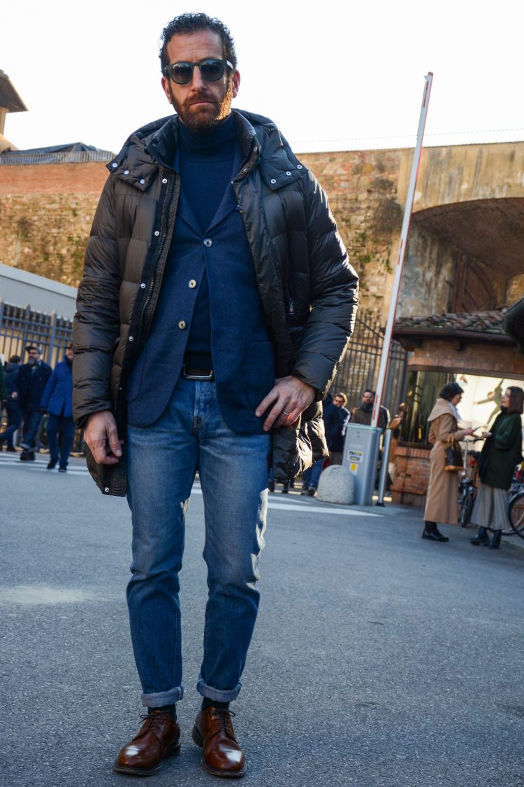 Mixed turtleneck knit layered with a tailored jacket and down jacket
