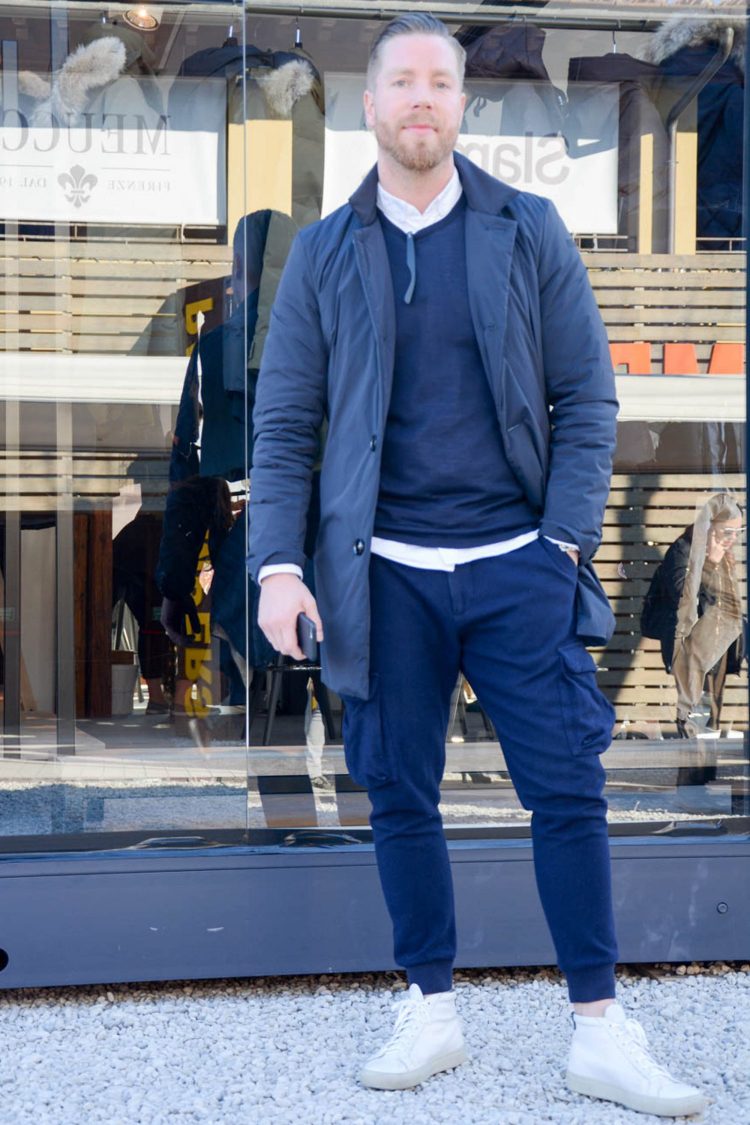 Jogger pants and high-cut sneakers coordinate with a nylon down coat for a sporty look