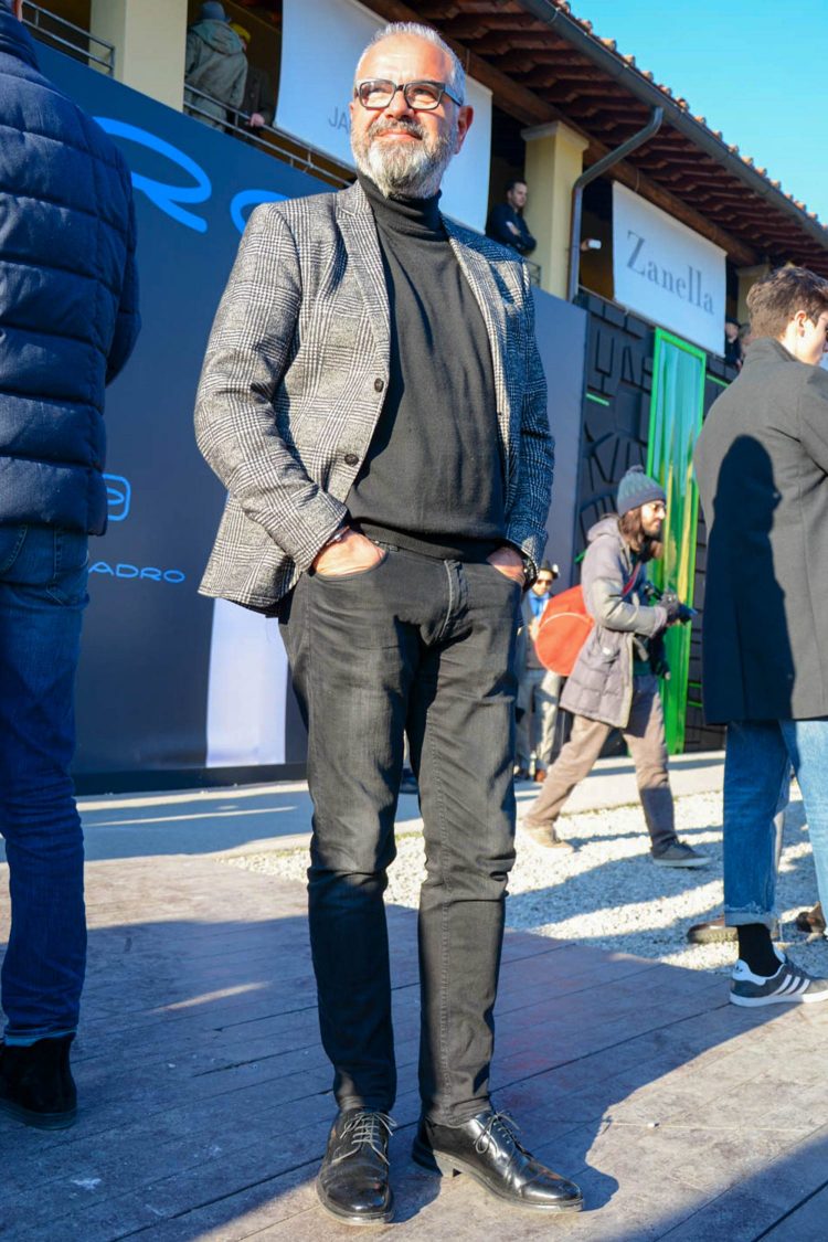Jacket and jeans style with black denim for a mode look.