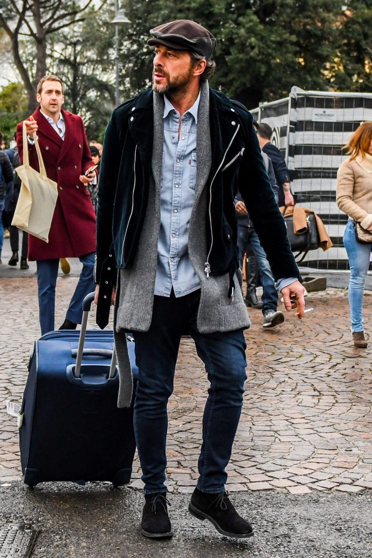 Winter coordinate with gray cordigan layered from rider's jacket