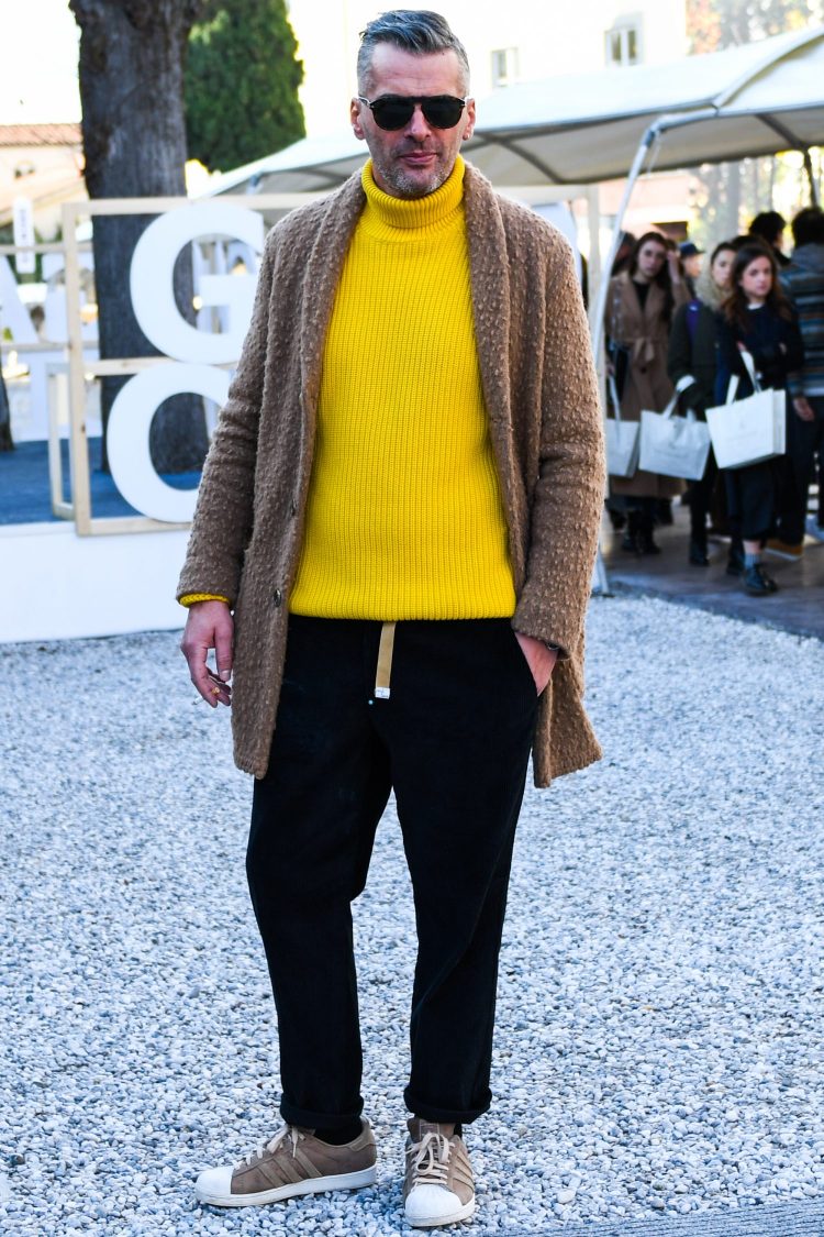 Yellow knitwear is chosen for a colorful outfit.