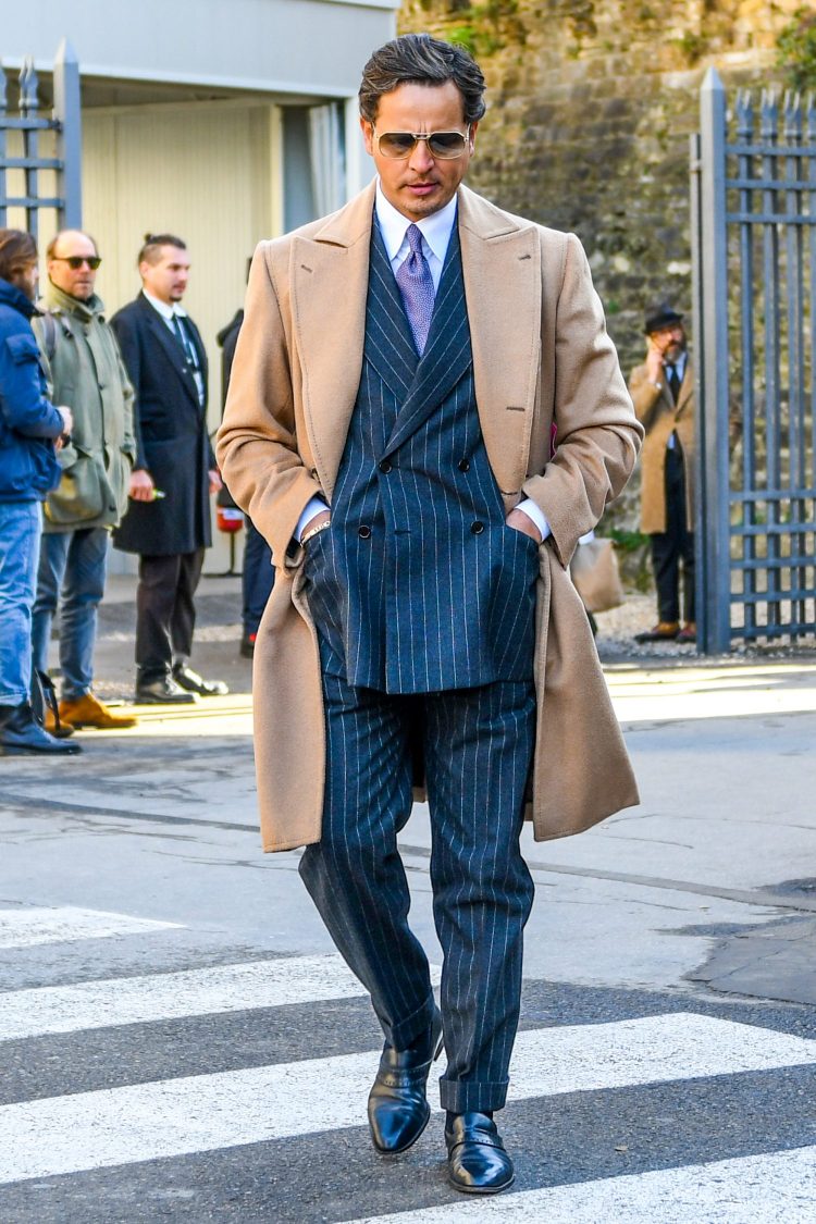 Charcoal gray striped gray suit expressing a powerful and stately atmosphere