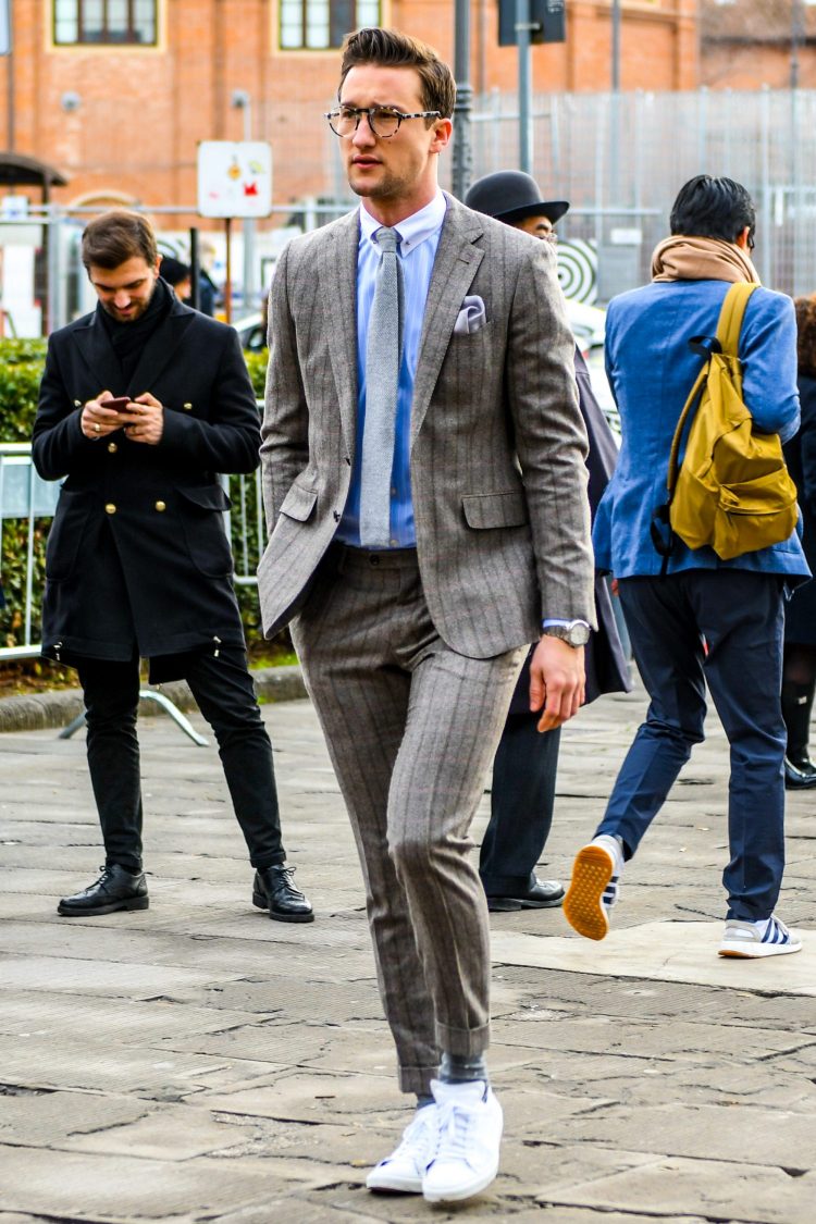 Casual business style created with a gray suit and white sneakers