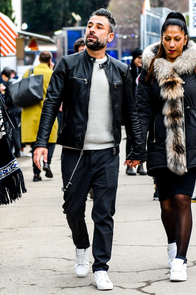 Gray pants coordinate with a monotone overall look for an urban and sophisticated atmosphere