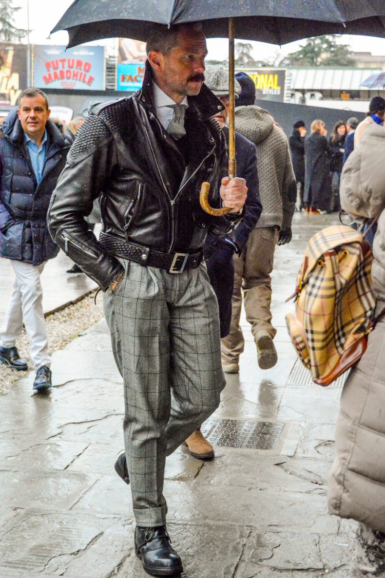 Dress mix style with a rider's jacket and elegant gray pants