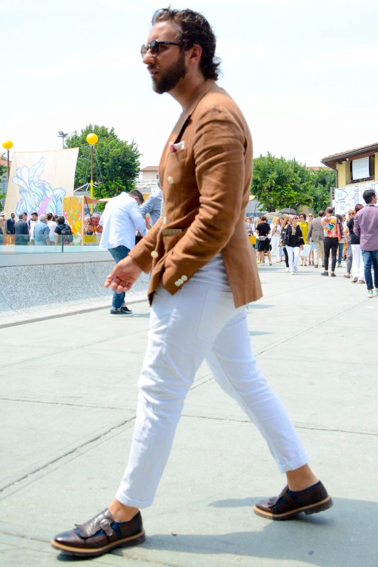 Brown double jacket and white pants with no ac