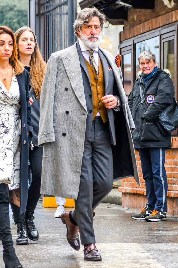 Gray suit coordinate accented with the incorporation of an odd gilet