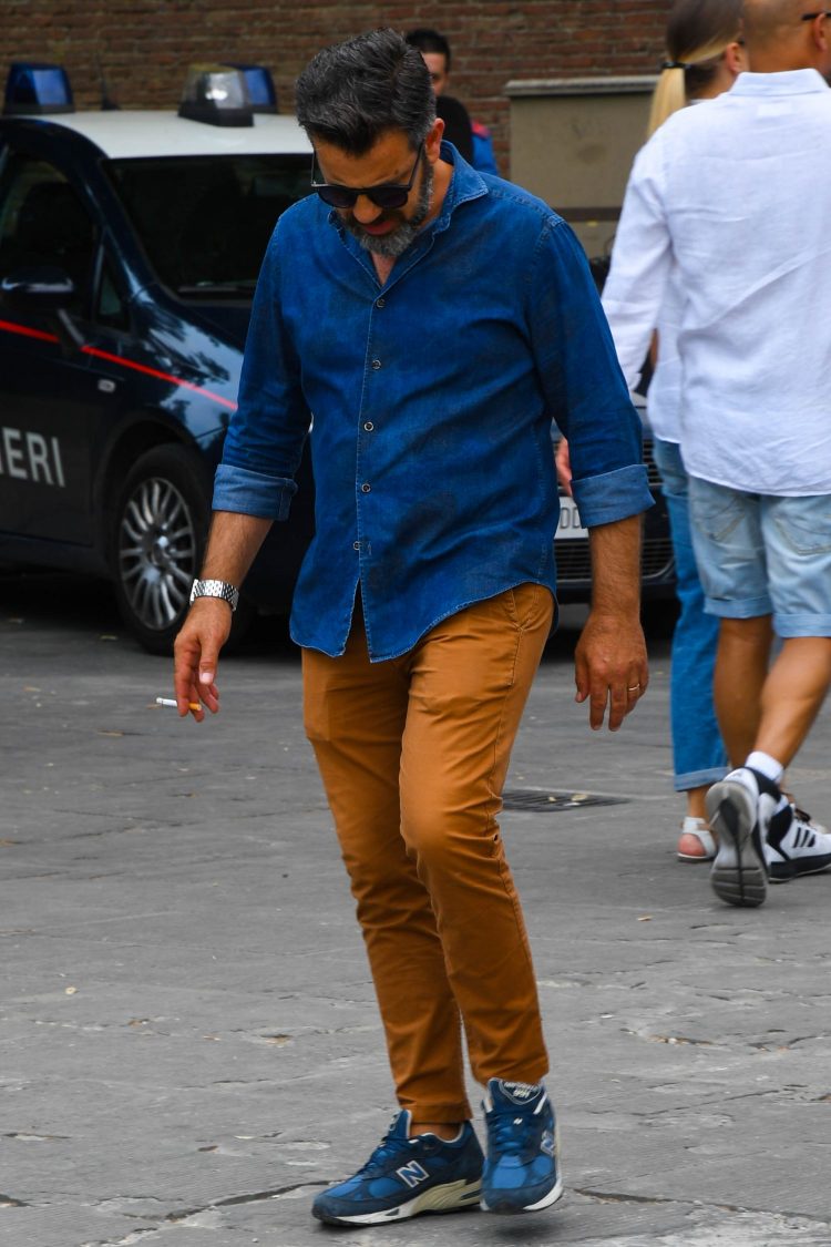 Deni shirt and New Balance sneakers in linked colors.