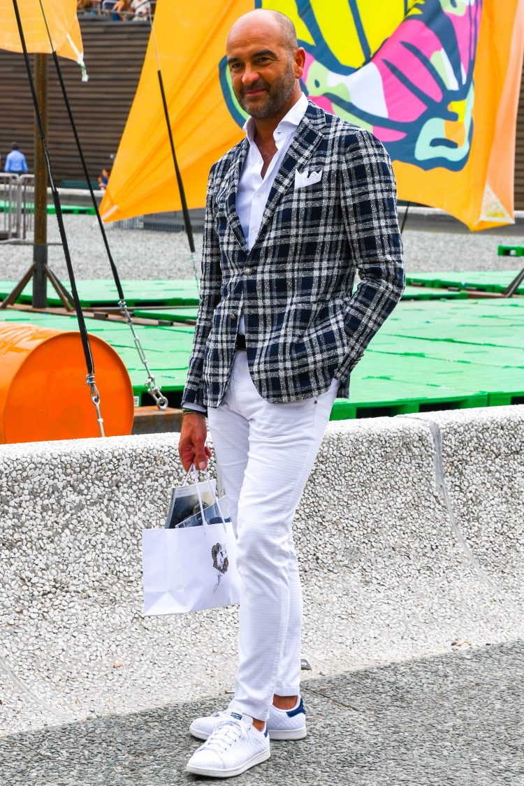 Check jacket and white jeans