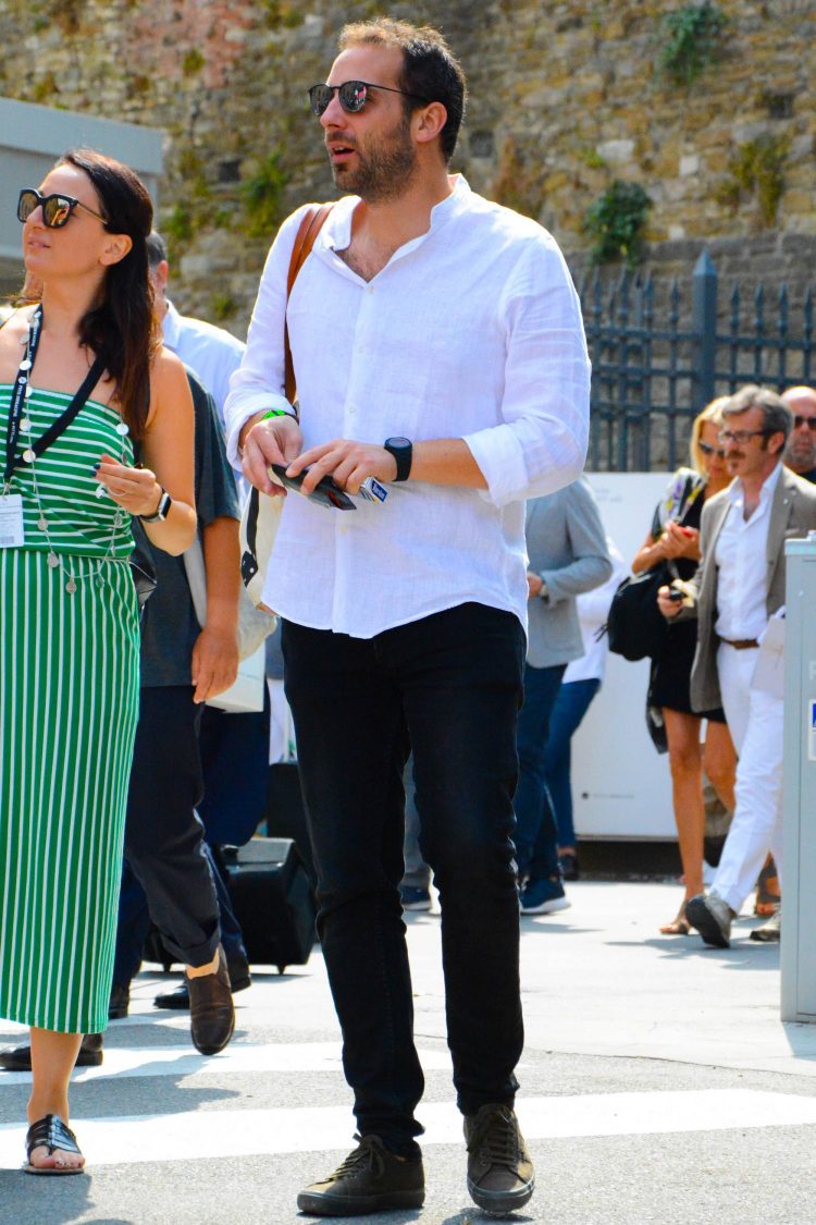 Black denim coordinate with linen shirt for a cooler look
