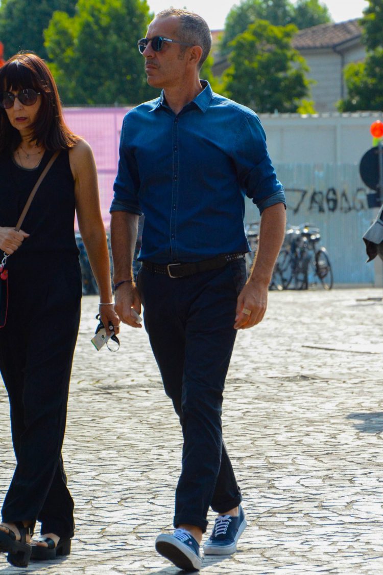 Tuck in a denim shirt for a classy look