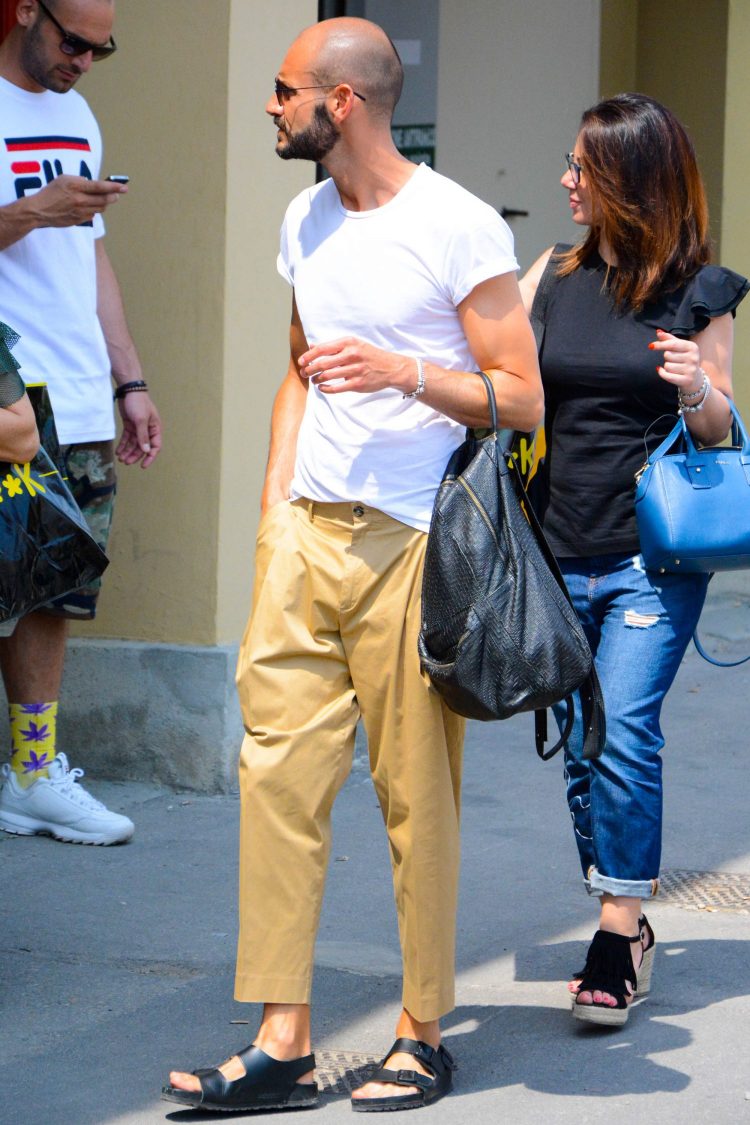 Chino pants with pleats is the current mood.