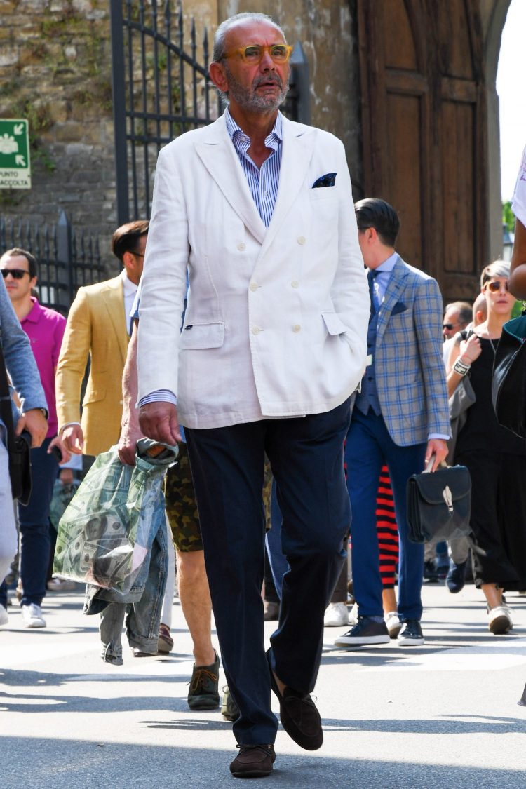 Pure white white jacket and navy blue pants