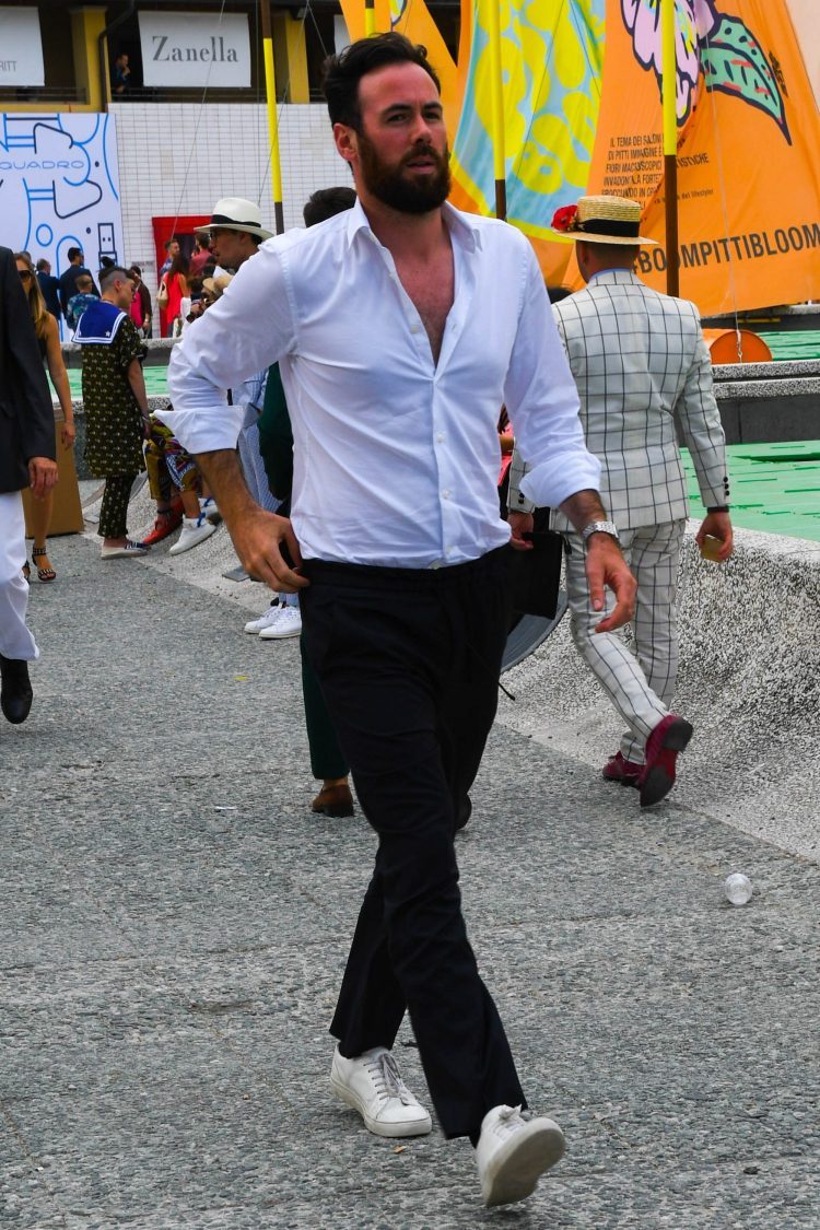 Mixed white shirt and black easy pants tucked in for a more dressy look