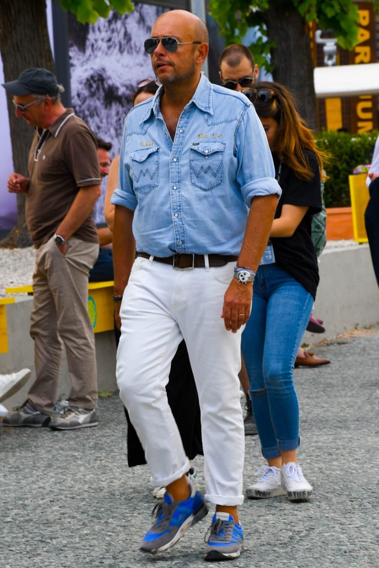 Western type denim shirt with white pants