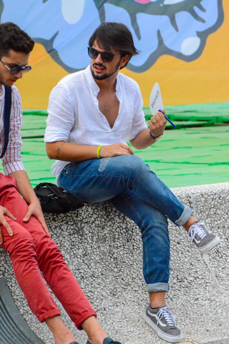 White shirt and jeans coordinate with band collar shirt and damaged jeans showing a subtle difference