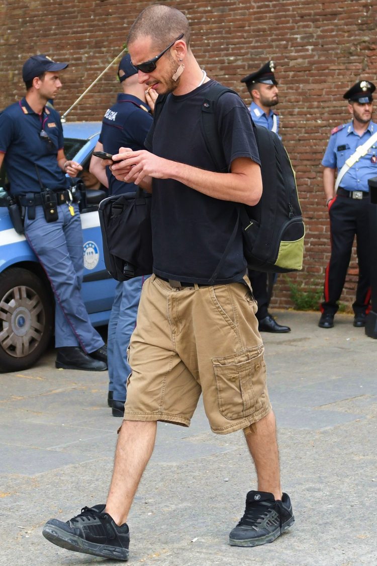 Black T-shirt and beige shorts for a modern conrast