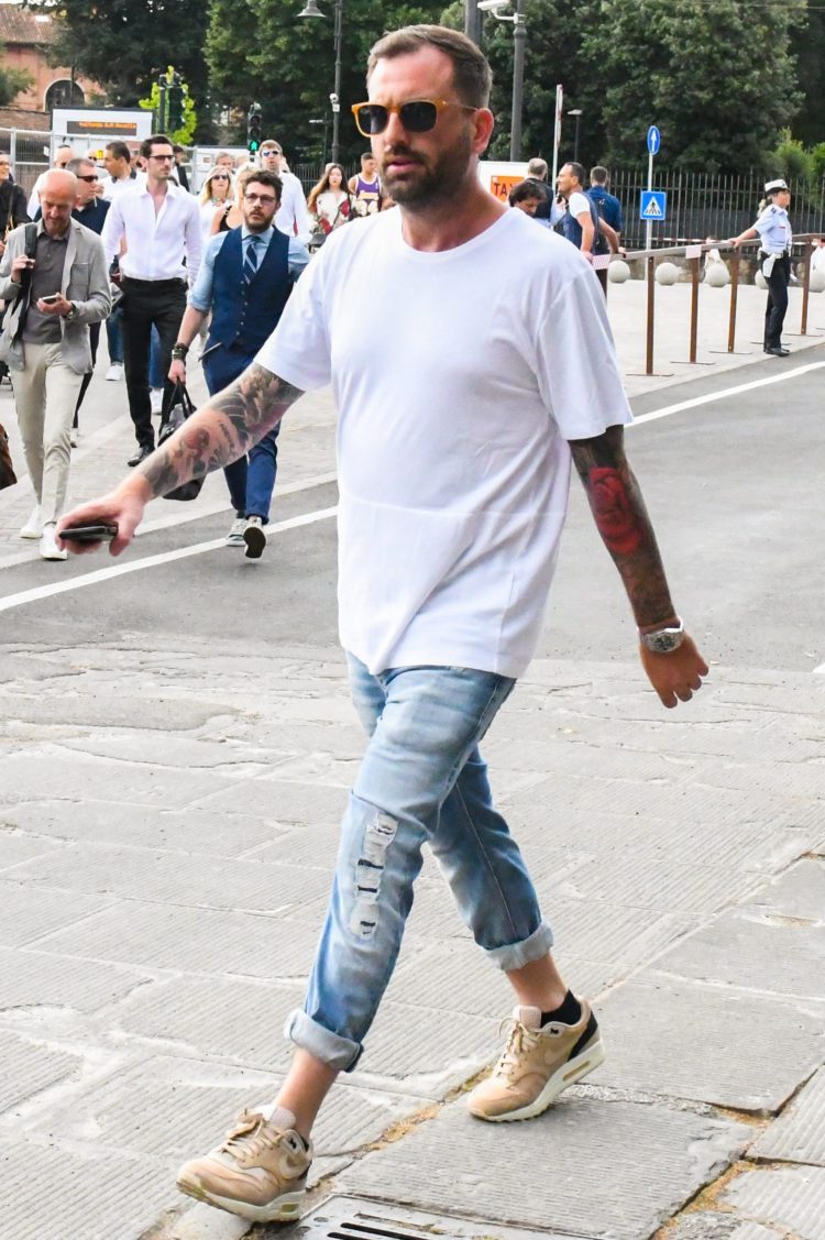 Roll ups give a crisp look to a box silhouette T-shirt and jeans