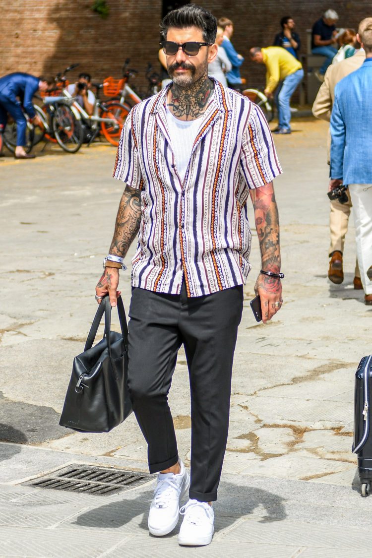 Patterned shirt paired with slacks