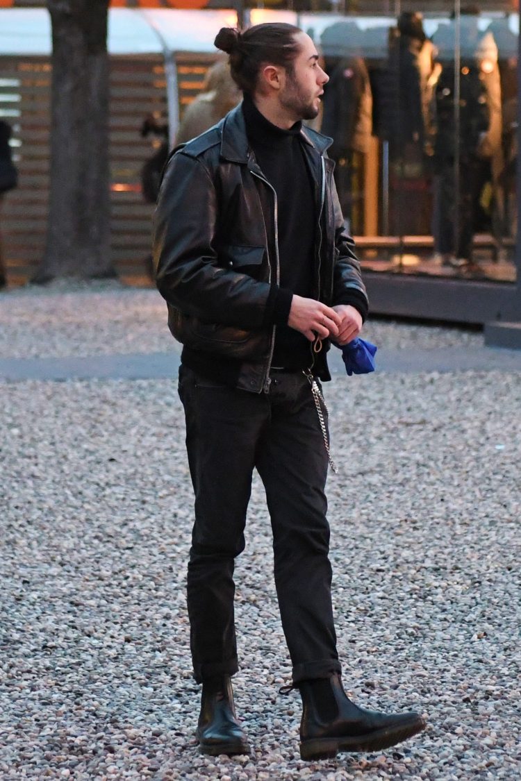 All-black rider's jacket coordinate with side gore boots for elegant footwear