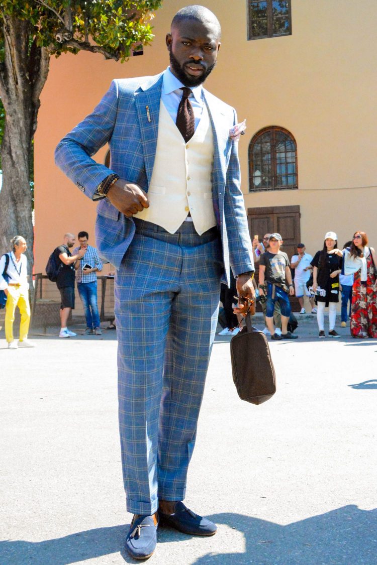 Suit and vest/gilet coordination linked by checkered accent color