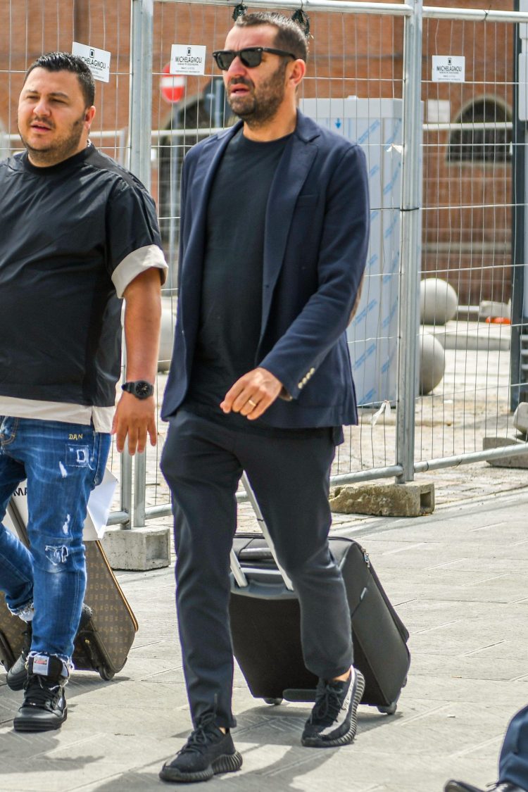 Cool jacket and sneaker coordinate in nuanced tones of navy and black