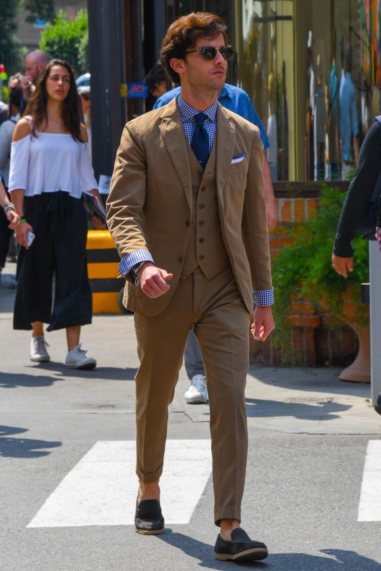 Brown three-piece with blue items for a lighter look