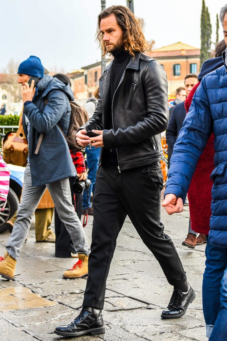 The all-black style of the riders' jacket accentuates the supple sheen of the leather