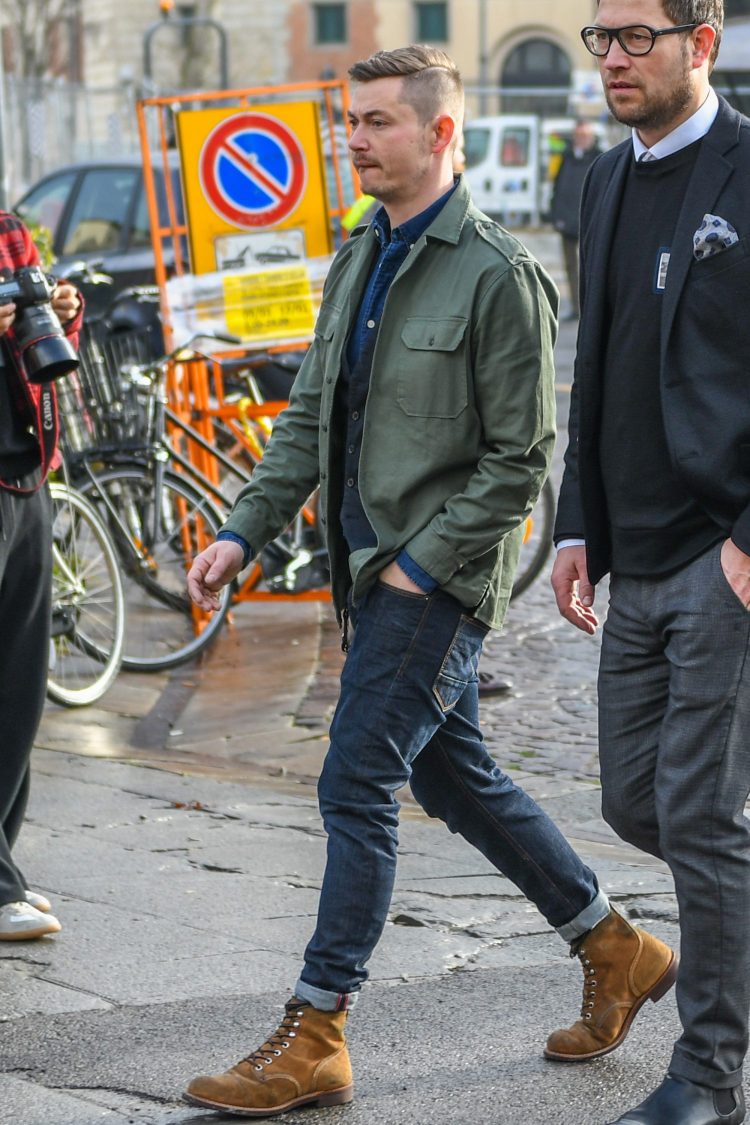 Military shirt jacket and rigid denim for a rugged look