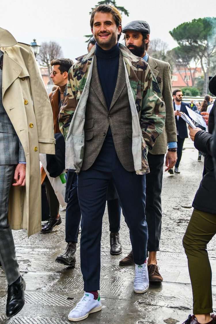 Camouflage-patterned military jacket blends in well with the British style