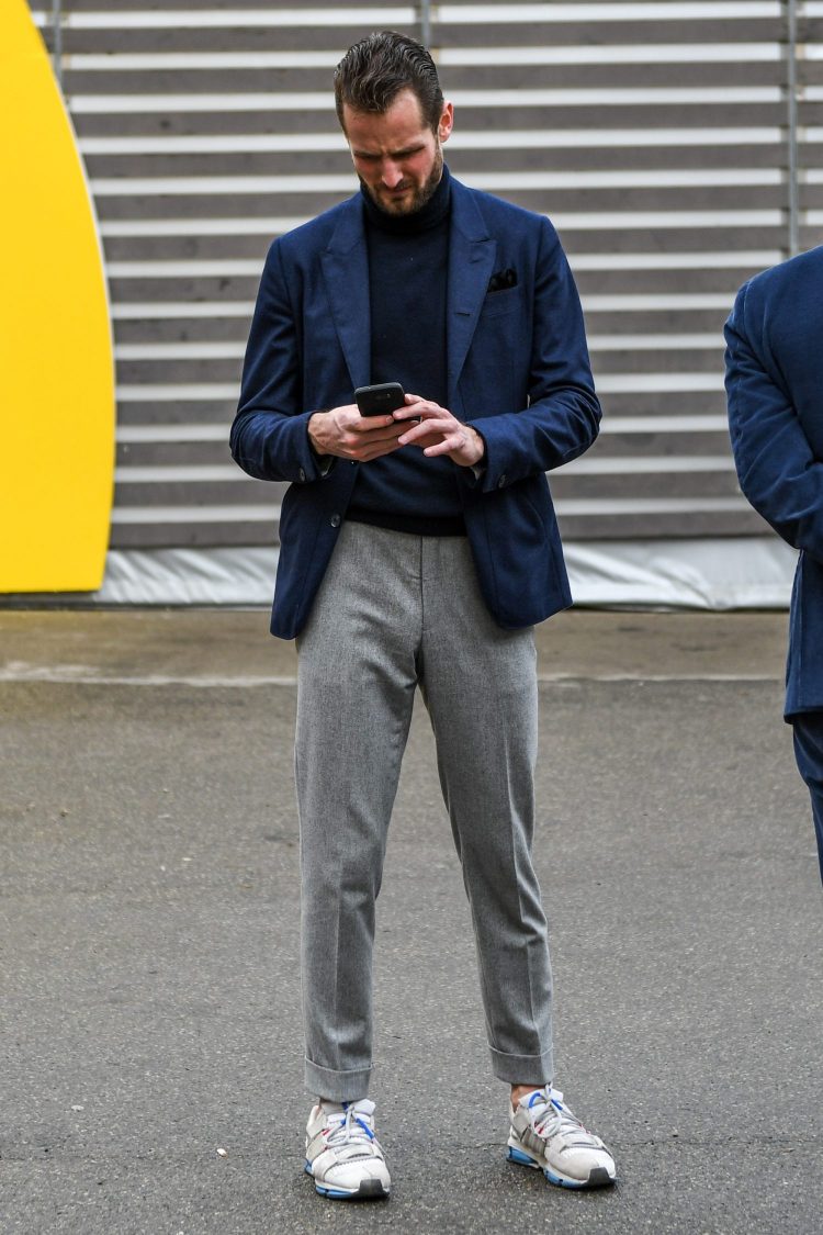 Navy jacket and gray winter pants coordinate with iron jacket style
