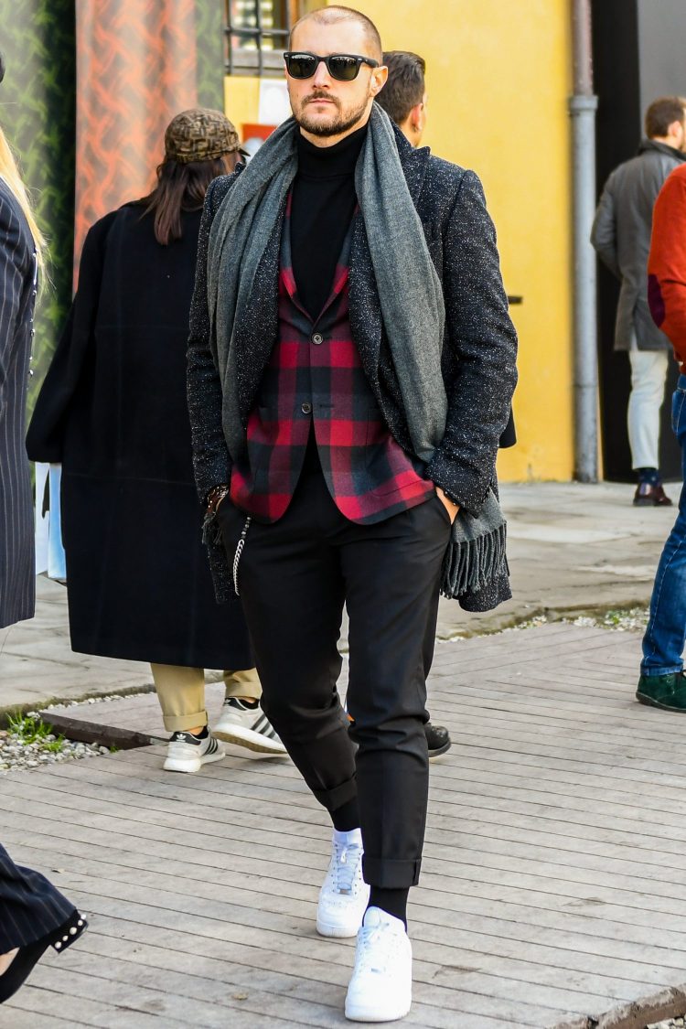 Red and black checkered jacket adds accent to a chic style
