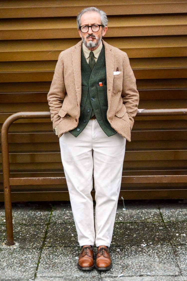 A traditional style with earthy colors and a checkered jacket adds a touch of glamour