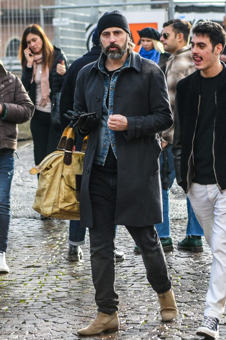 Denim-on-denim black denim coordinate smartly expressed with a stainless steel collar coat