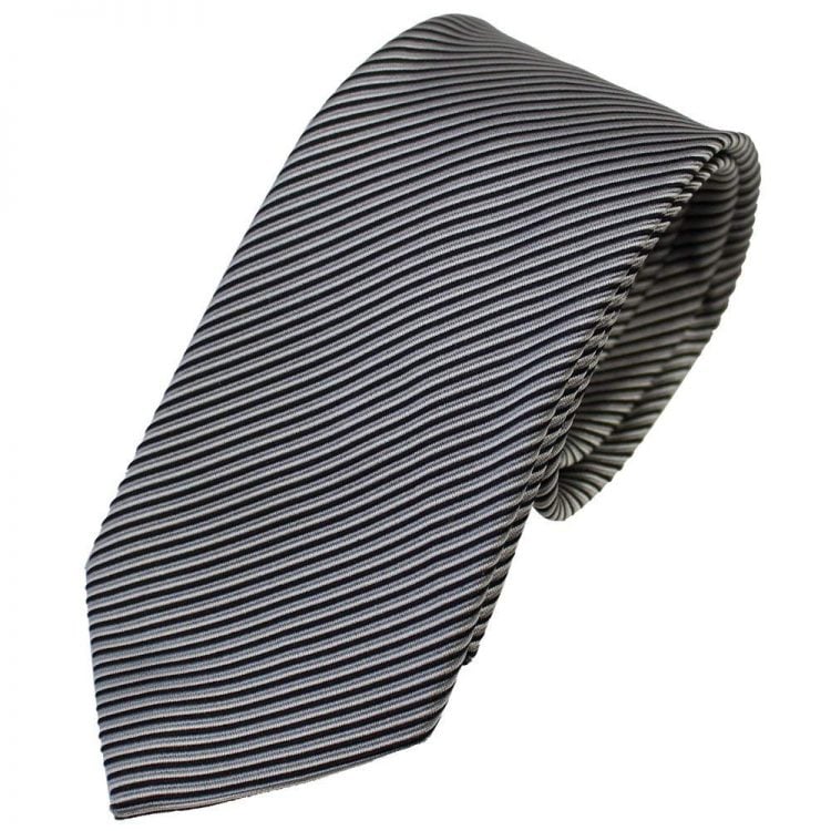 Fine striped ties favored by the French are acceptable for formal occasions.